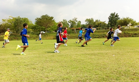 Running rugby the order of the day as Year 8 take on Year 7.